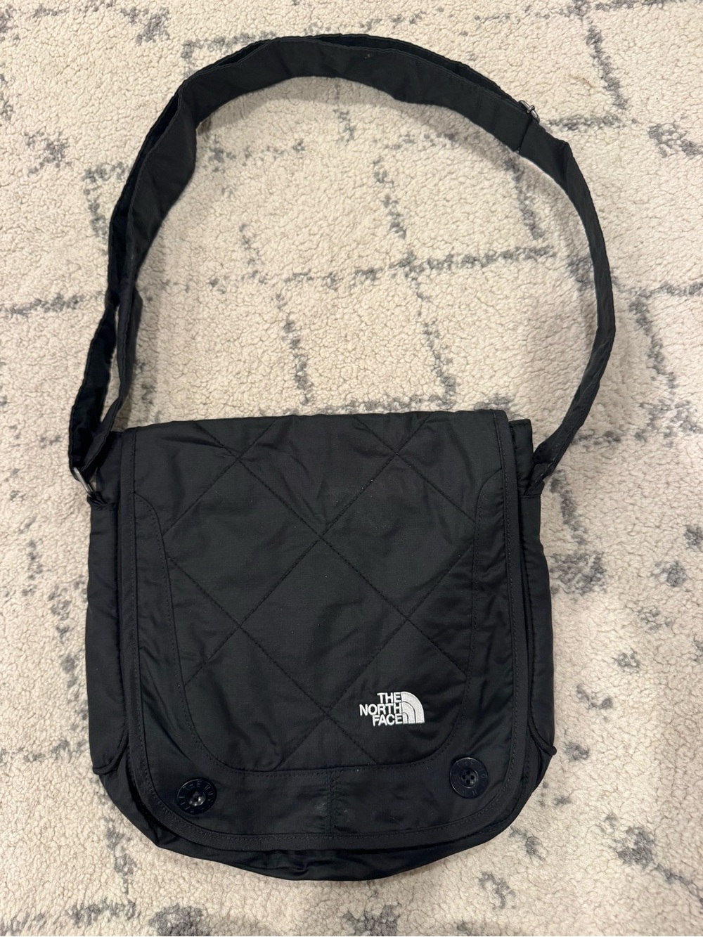 The North Face Black Quilted Messenger Crossbody Bag